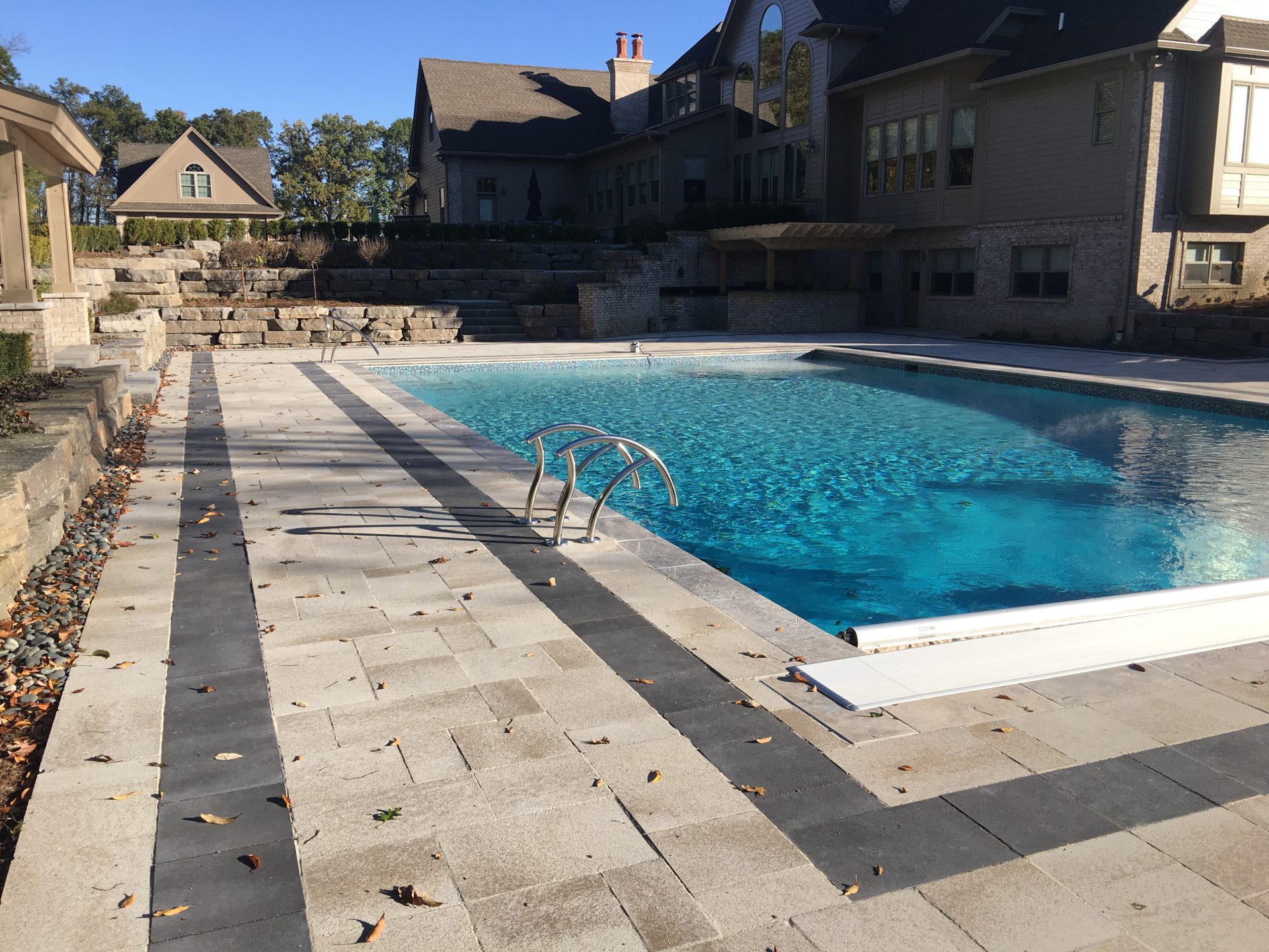 Pool with natural stone steps and landscaping